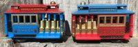 Blue and Red Toy Cable Cars
